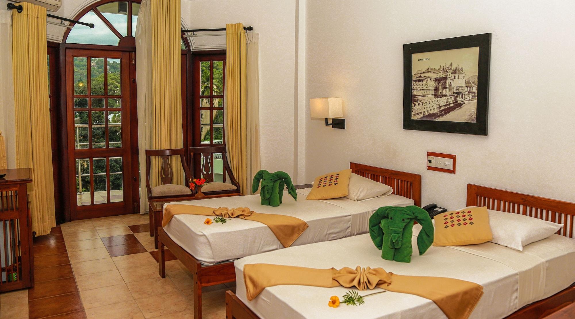 Senani Hotel Канди Экстерьер фото