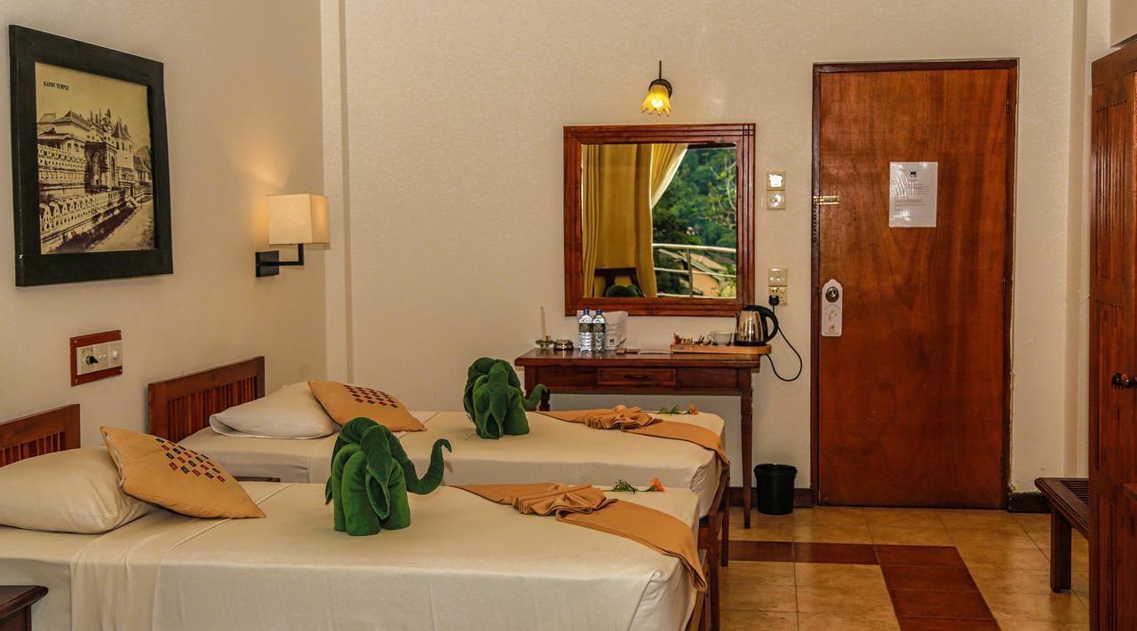 Senani Hotel Канди Экстерьер фото
